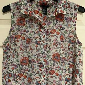 Sleeveless button down shirt